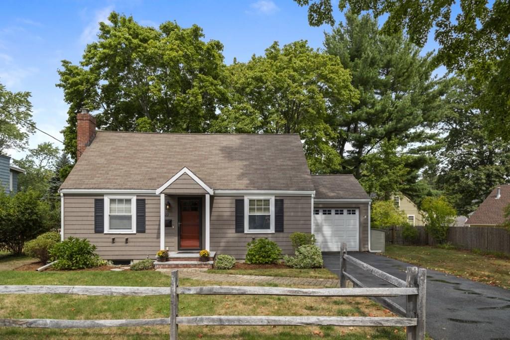 22 Irving Street Reading, MA 01867 - Photo 2 of 37 front view of a house with a yard