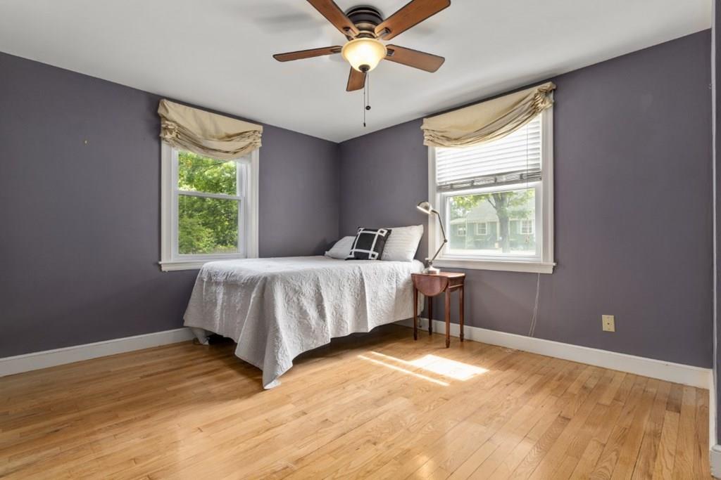 22 Irving Street Reading, MA 01867 - Photo 23 of 37 a bedroom with a bed and window
