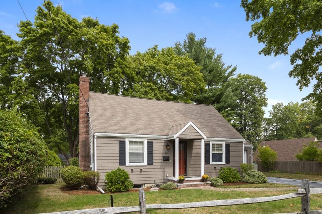 22 Irving Street Reading, MA 01867 - Photo 3 of 37 a front view of a house with a yard