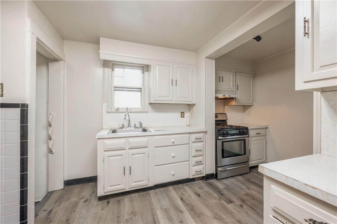 29 Morgan Street New Rochelle, NY 10805 - Photo 1 of 1 Kitchen freshly painted with new ceramic flooring