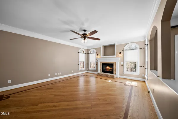 a bathroom with a double vanity sink mirror and shower