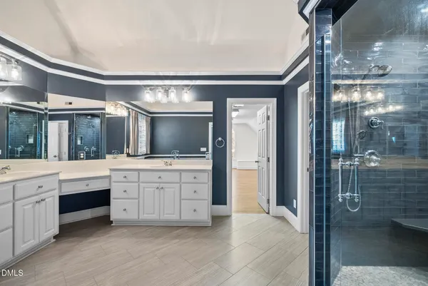 a front view of a house with a yard table and chairs