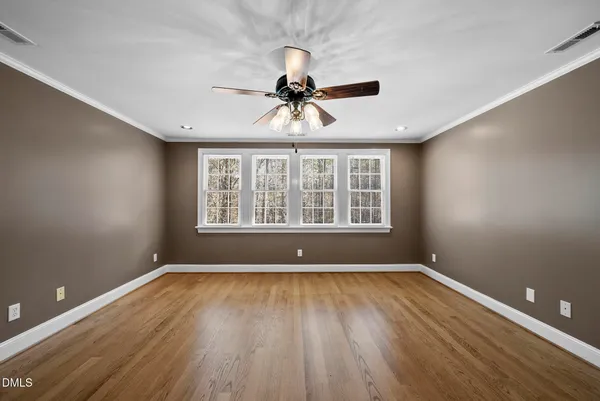 an aerial view of a house with yard swimming pool and outdoor seating