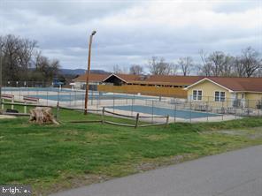 5 Hilo Road Falling Waters, WV 25419 - Photo 13 of 19 a view of a garden with a slide