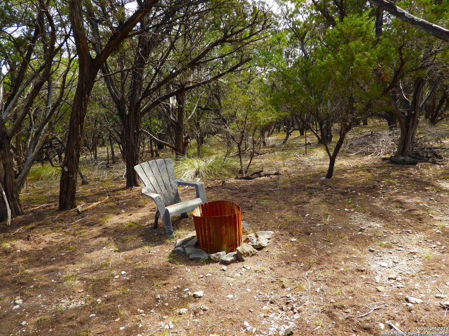 Tbd Simmons Road Lakehills, TX 78063 - Photo 4 of 22 a view of a yard with large trees