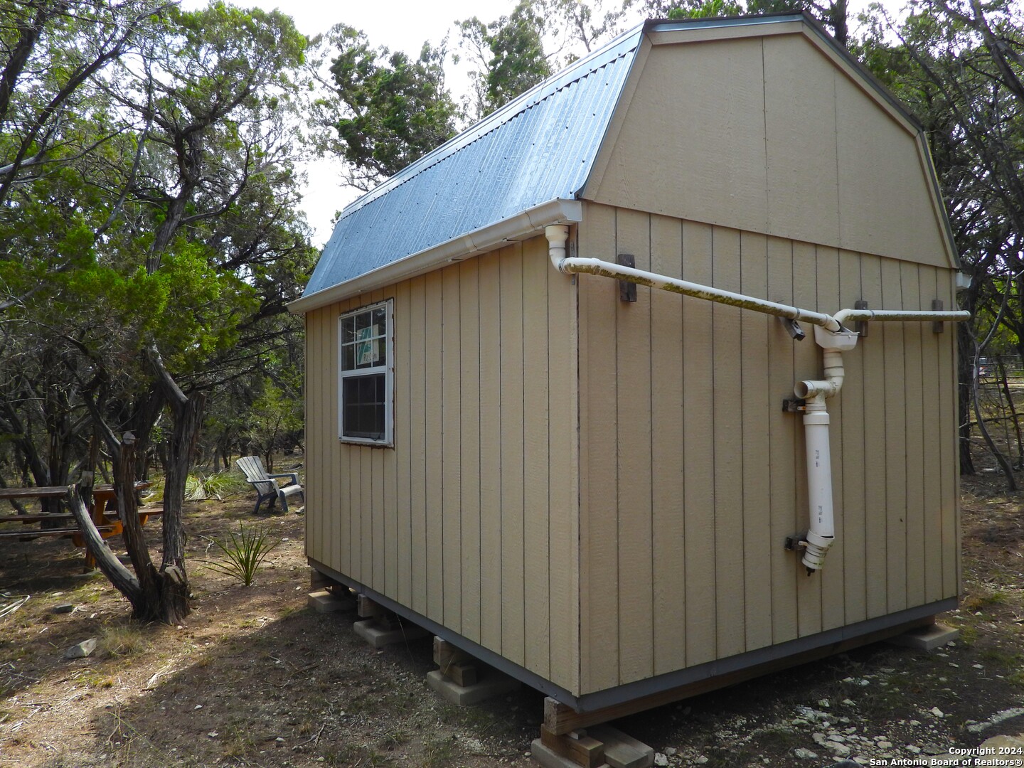 Tbd Simmons Road Lakehills, TX 78063 - Photo 6 of 22 a backyard of a house
