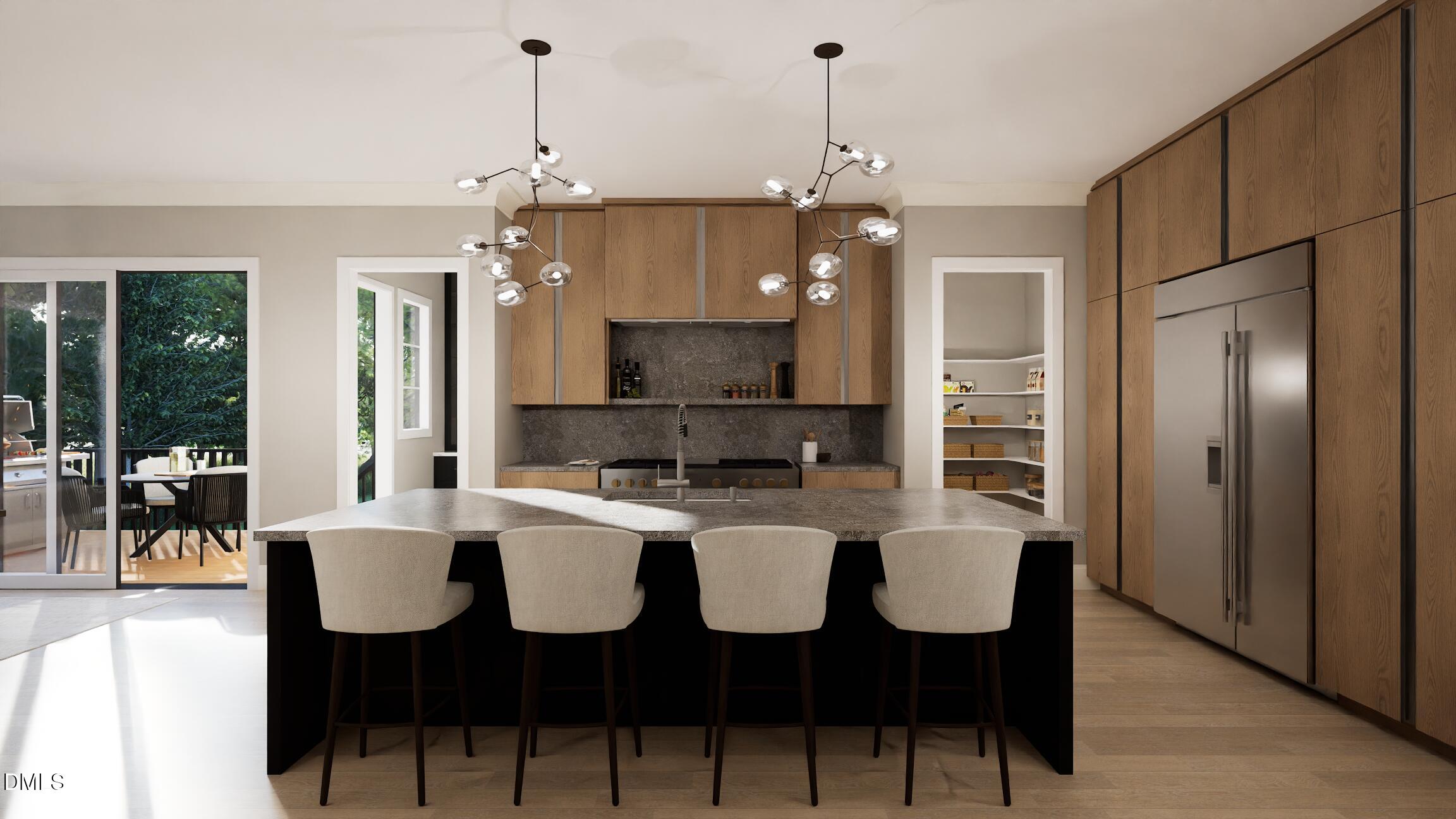 408 Shinleaf Pond Trail Raleigh, NC 27614 - Photo 13 of 77 a large kitchen with a table and chairs