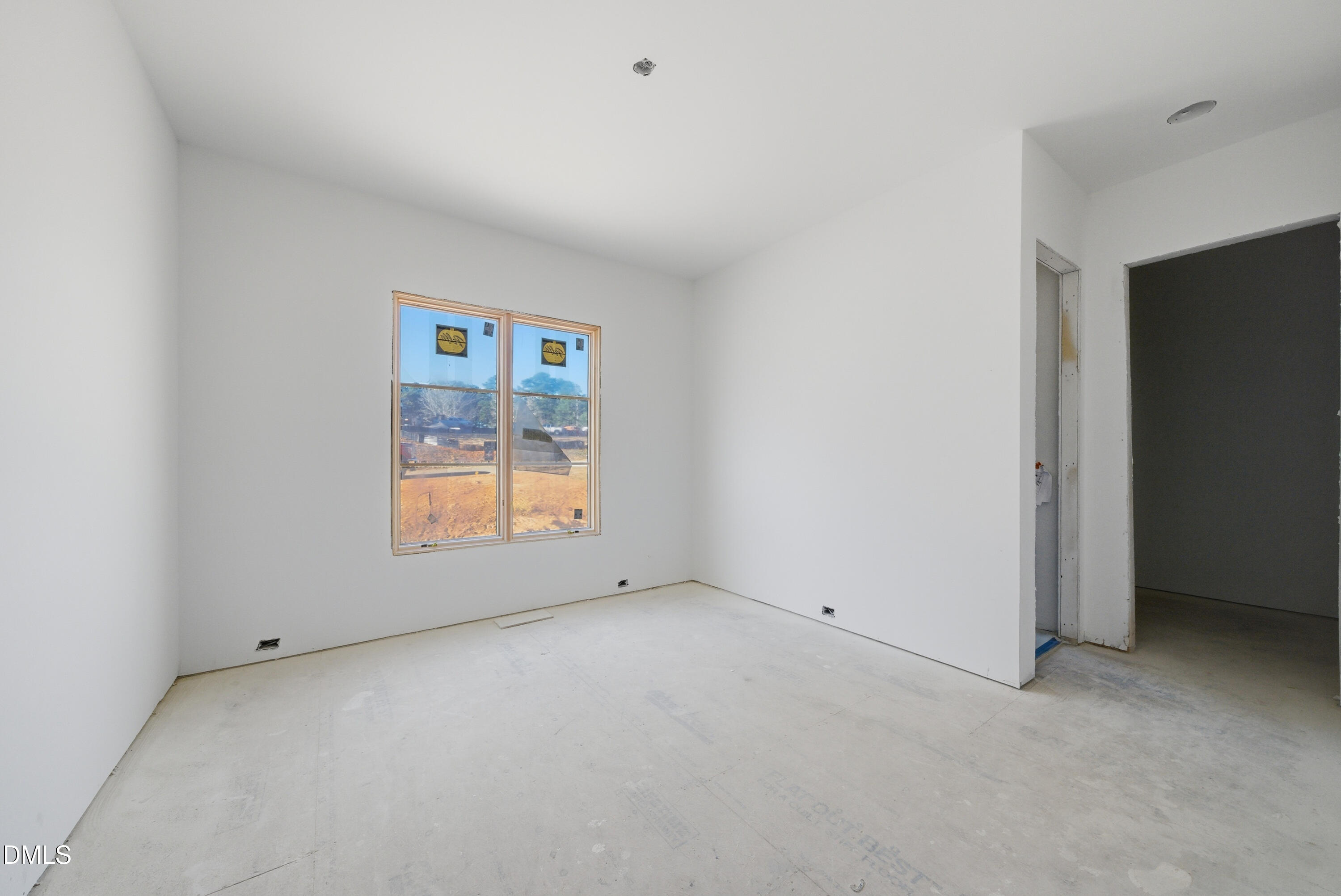 408 Shinleaf Pond Trail Raleigh, NC 27614 - Photo 41 of 77 an empty room with a window