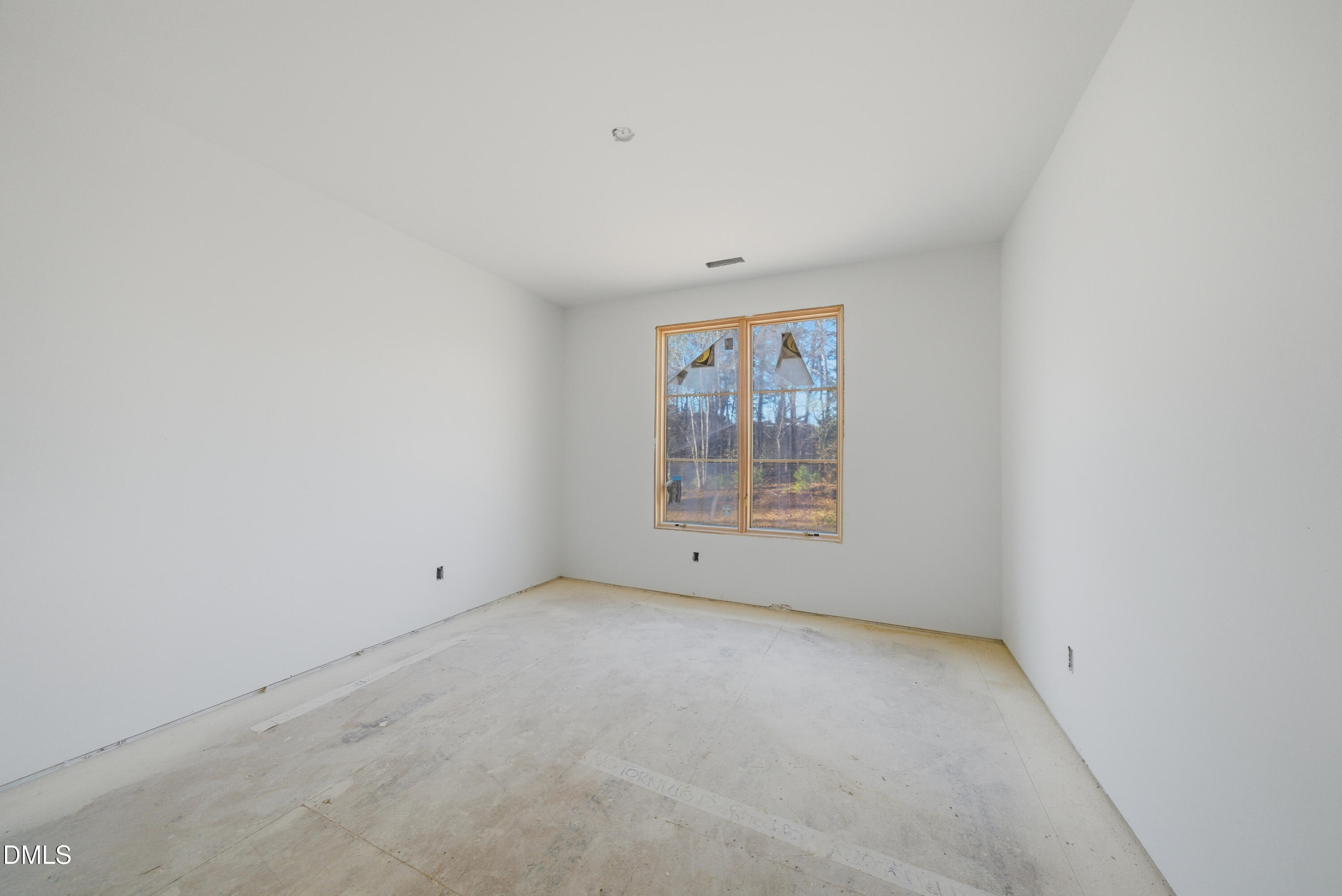 408 Shinleaf Pond Trail Raleigh, NC 27614 - Photo 45 of 75 a view of an empty room with a window