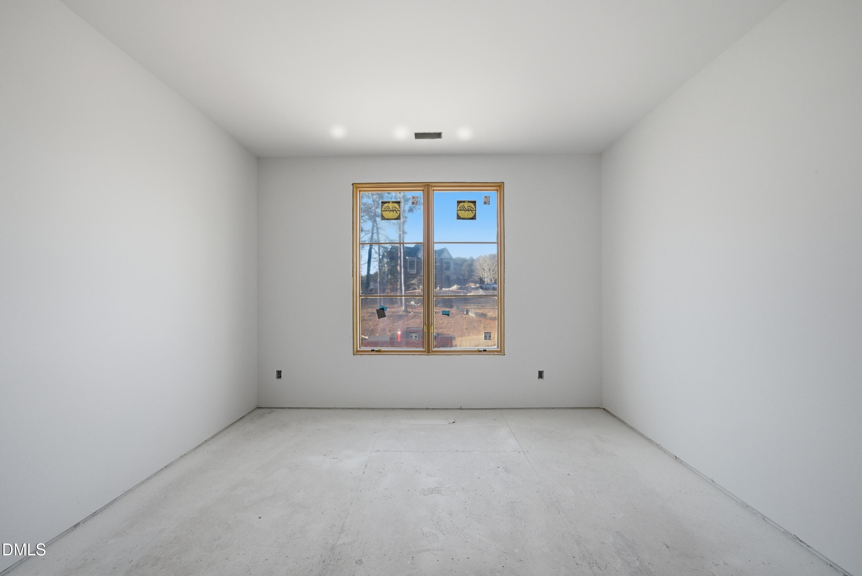 408 Shinleaf Pond Trail Raleigh, NC 27614 - Photo 50 of 75 a view of an empty room with a window