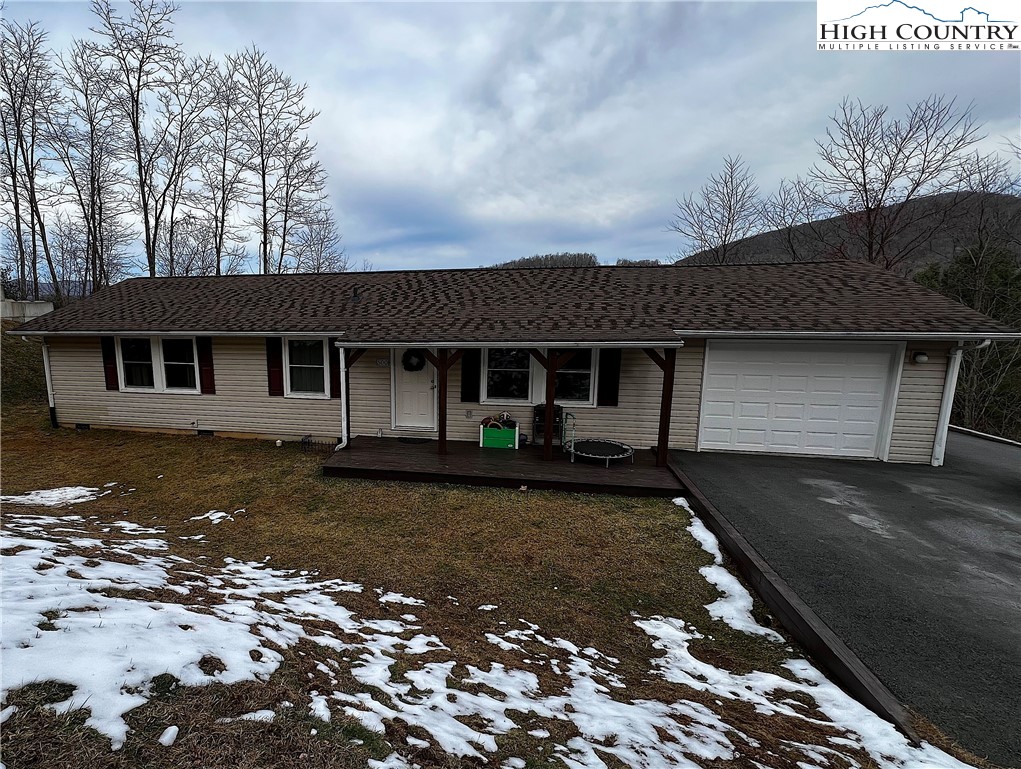 500 White Laurel Lane Boone, NC 28607 - Photo 2 of 41 front view of a house with a patio