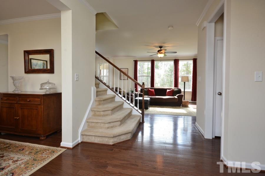 1007 Lakeview Road Durham, NC 27712 - Photo 5 of 25 a view of entryway and hall with wooden floor