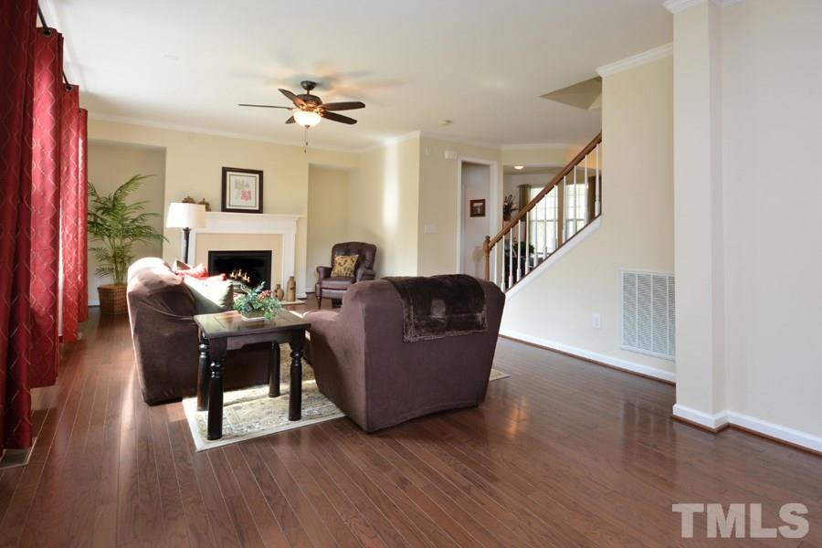 1007 Lakeview Road Durham, NC 27712 - Photo 7 of 25 a living room with furniture and a fireplace