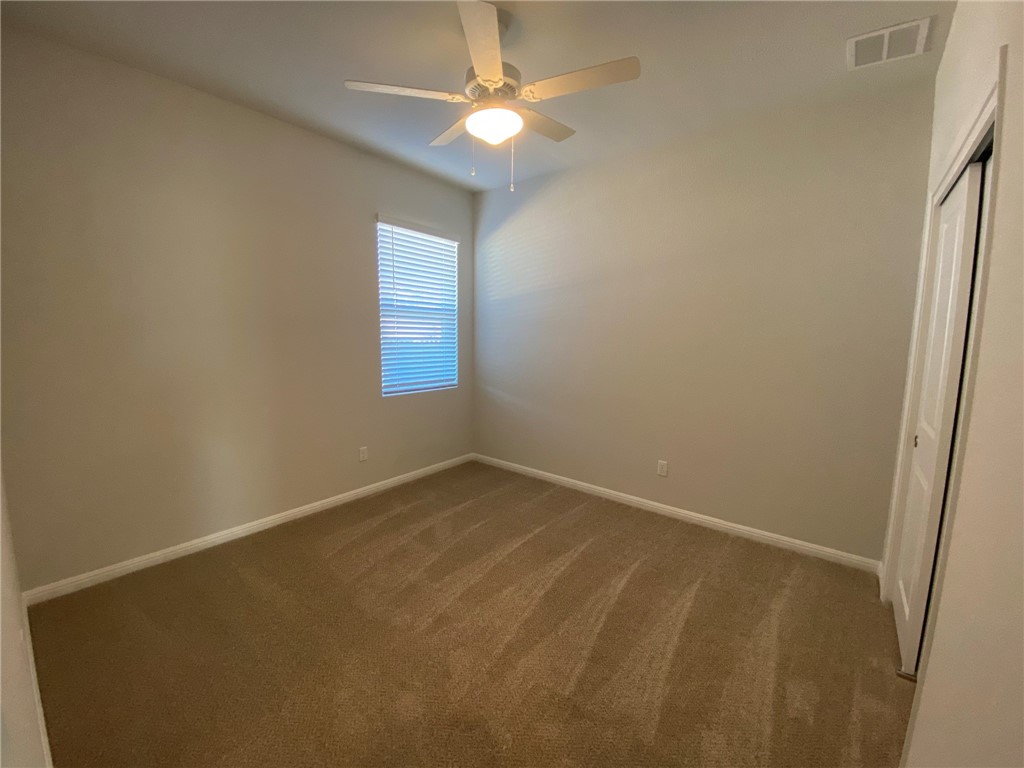 384 Gaida Loop Georgetown, TX 78628 - Photo 14 of 20 Bedroom # 3 includes ceiling fan and blinds