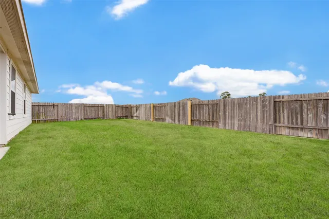 a front view of a house with yard