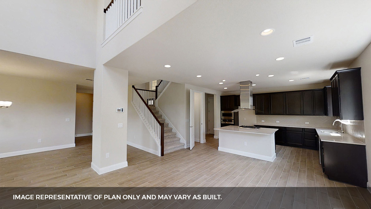 516 Prairie Wind Drive Leander, TX 78641 - Photo 11 of 40 a living room with furniture and a flat screen tv