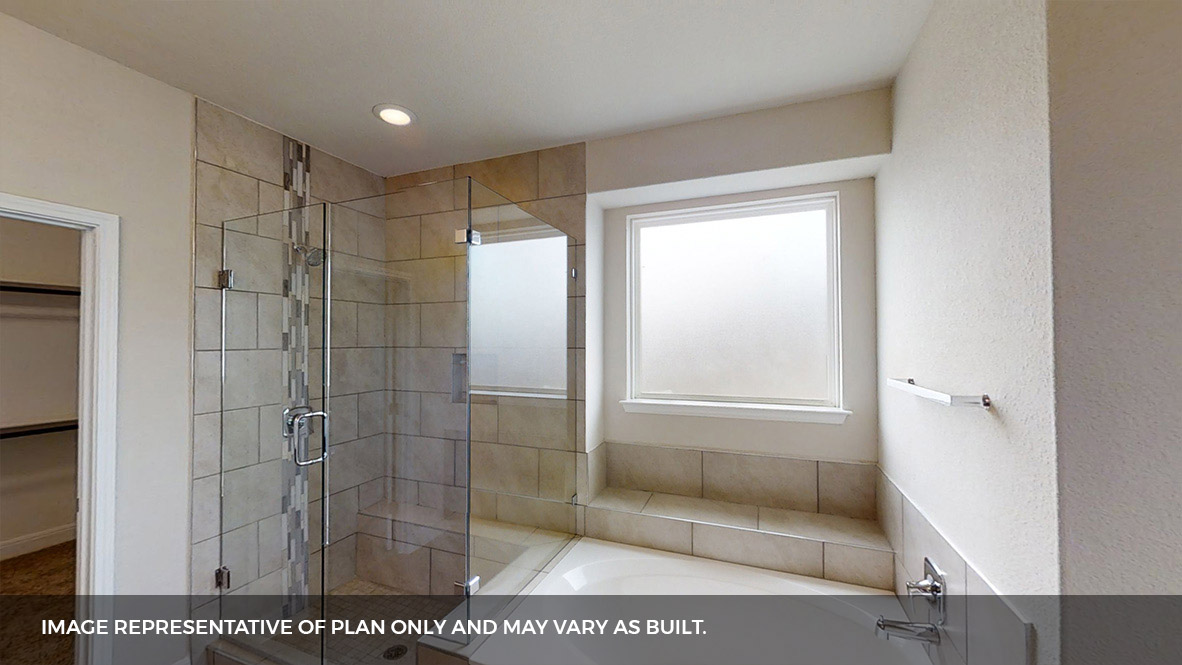 516 Prairie Wind Drive Leander, TX 78641 - Photo 18 of 40 a bathroom with a shower