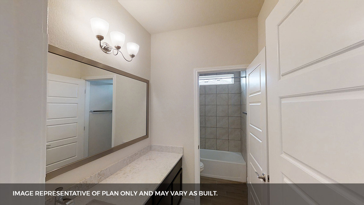 516 Prairie Wind Drive Leander, TX 78641 - Photo 19 of 40 a bathroom with a shower