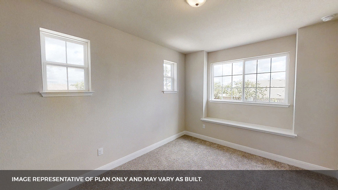 516 Prairie Wind Drive Leander, TX 78641 - Photo 25 of 40 an empty room with wooden floor and windows