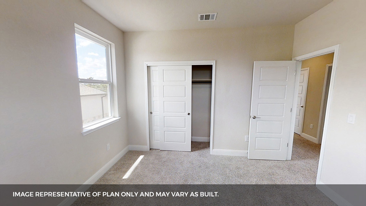 516 Prairie Wind Drive Leander, TX 78641 - Photo 26 of 40 a view of an empty room with window and closet area