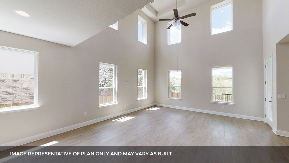 516 Prairie Wind Drive Leander, TX 78641 - Photo 9 of 40 a view of an empty room with a window