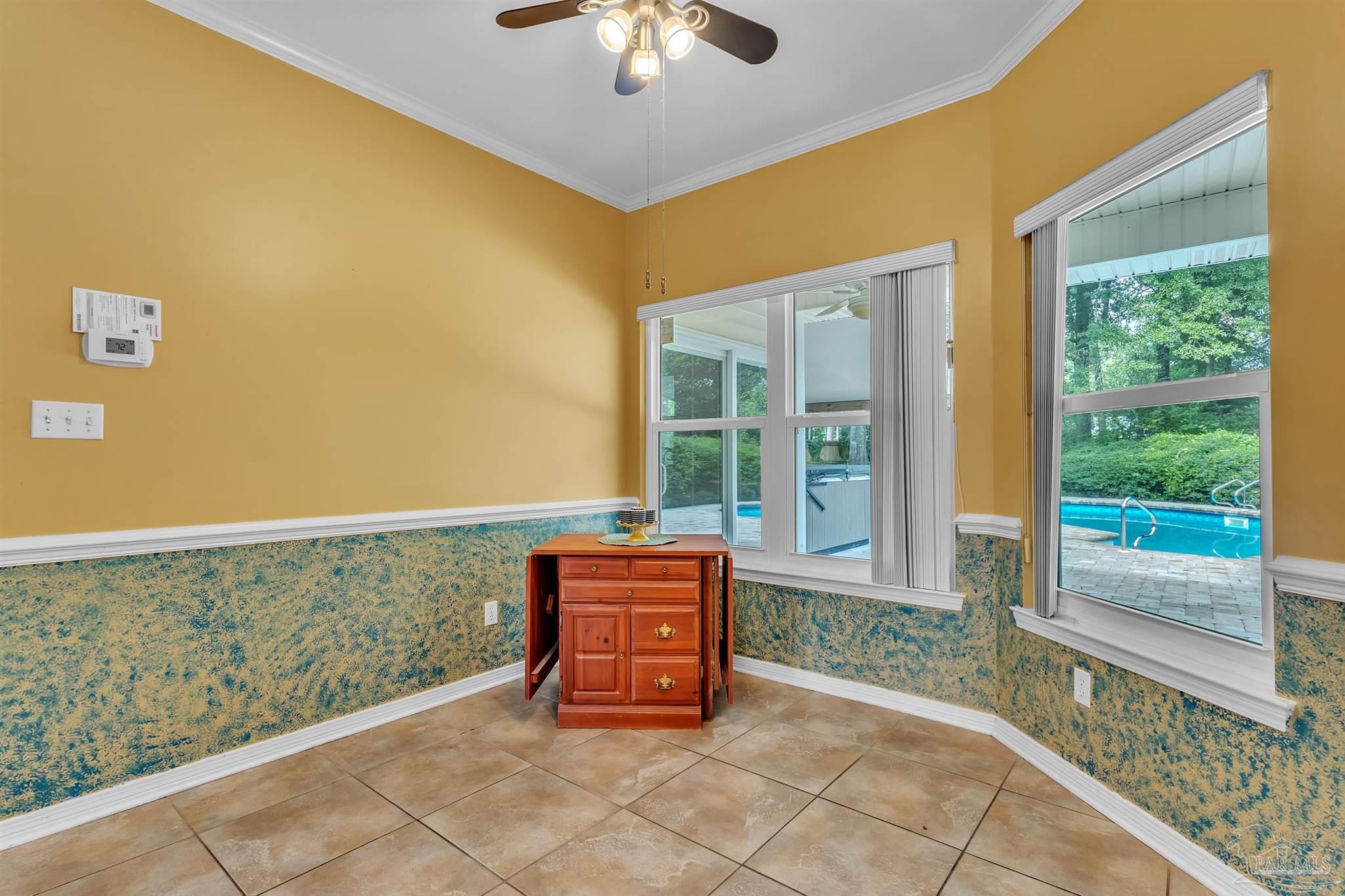 11705 Cabot Street Cantonment, FL 32533 - Photo 18 of 36 a building with a outdoor space