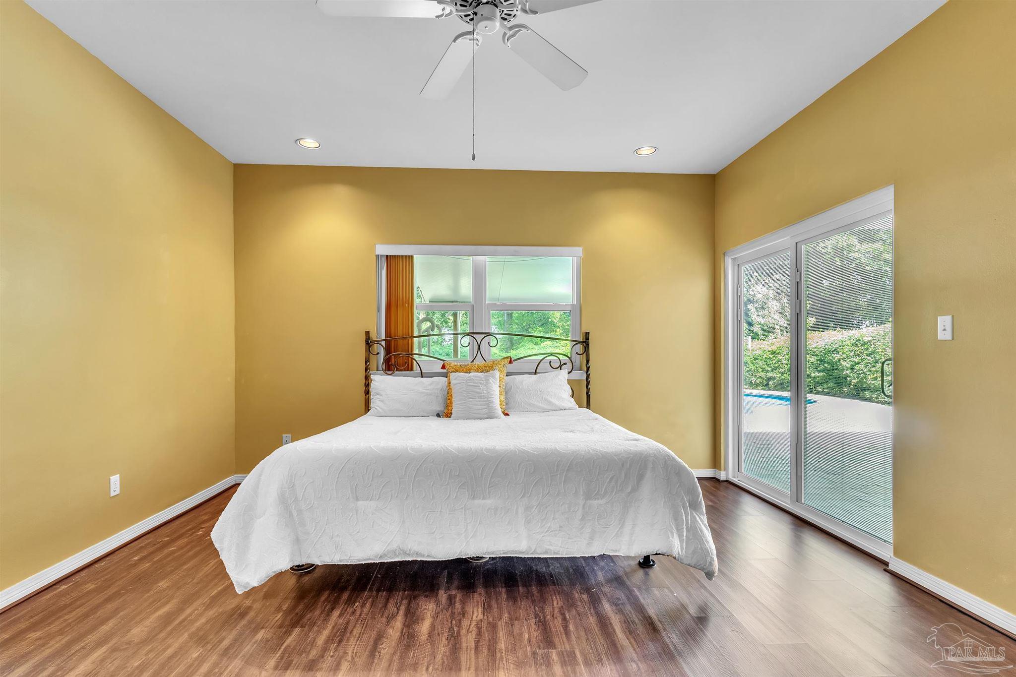 11705 Cabot Street Cantonment, FL 32533 - Photo 20 of 36 a bedroom with a bed and a window