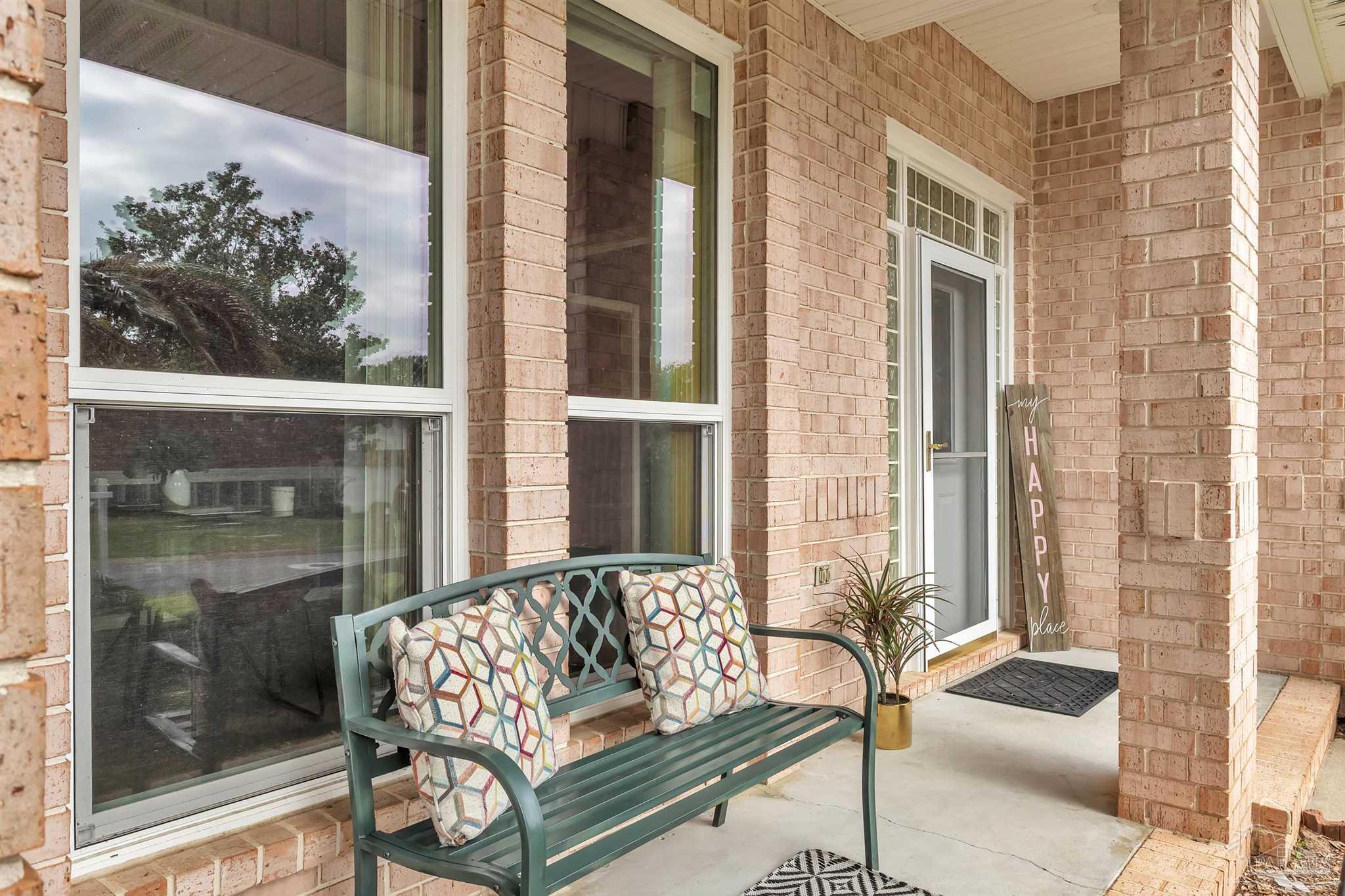 11705 Cabot Street Cantonment, FL 32533 - Photo 9 of 36 a view of a balcony with furniture