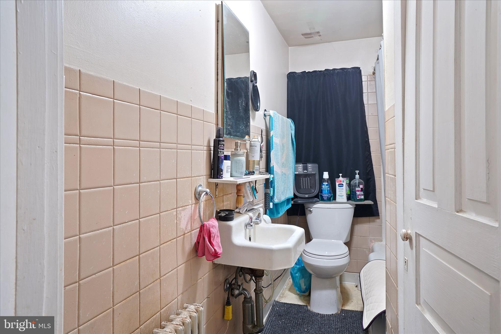300 Friedensburg Road Reading, PA 19606 - Photo 19 of 26 a bathroom with a sink toilet and shower