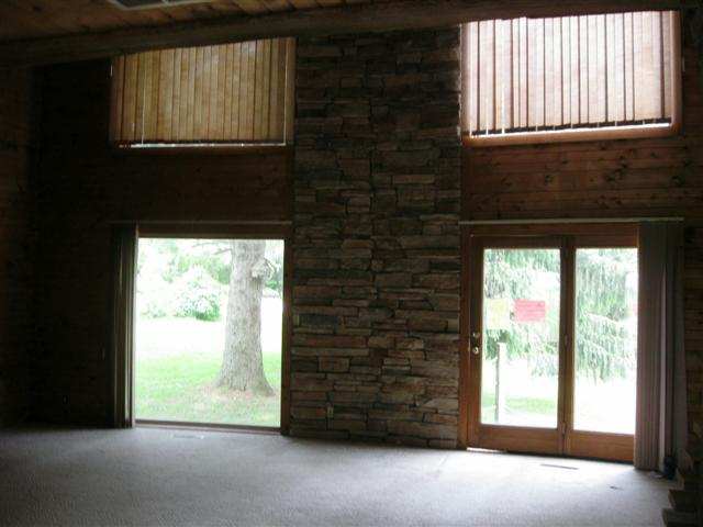 2387 Lancaster Heights Road Freeport, IL 61032 - Photo 2 of 9 a view of an empty room and a window
