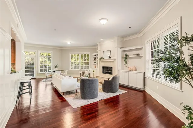 a bedroom with a large bed and a couch