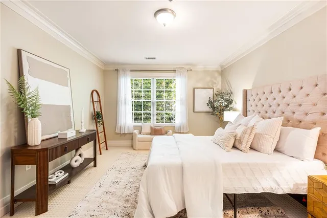 a bathroom with a granite countertop sink a large mirror and a bathtub