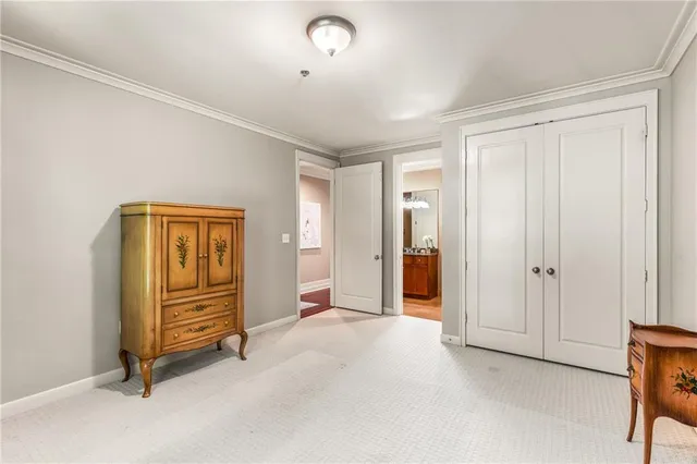 a bathroom with a granite countertop sink toilet mirror and shower