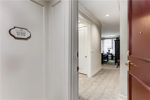 a front view of a residential apartment building with a yard