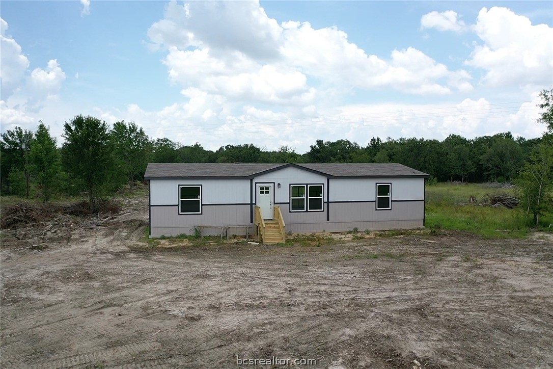 9960 Goose Prairie Road Midway, TX 75852 - Photo 10 of 36 a house view with a backyard space