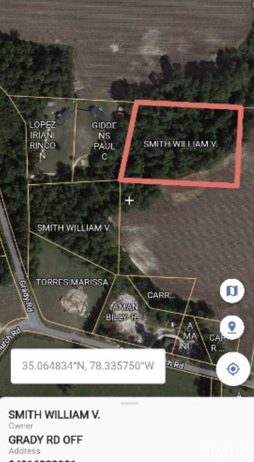 1-2 Grady Road Clinton, NC 28328 - Photo 3 of 4 a black and white photo of a garden