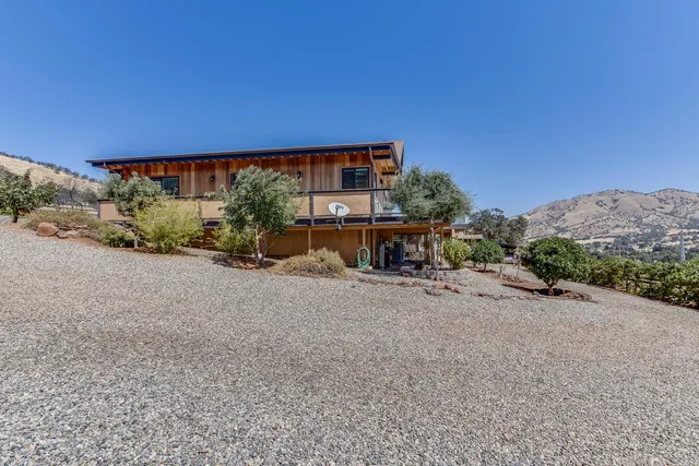 a view of a road with a building in the background