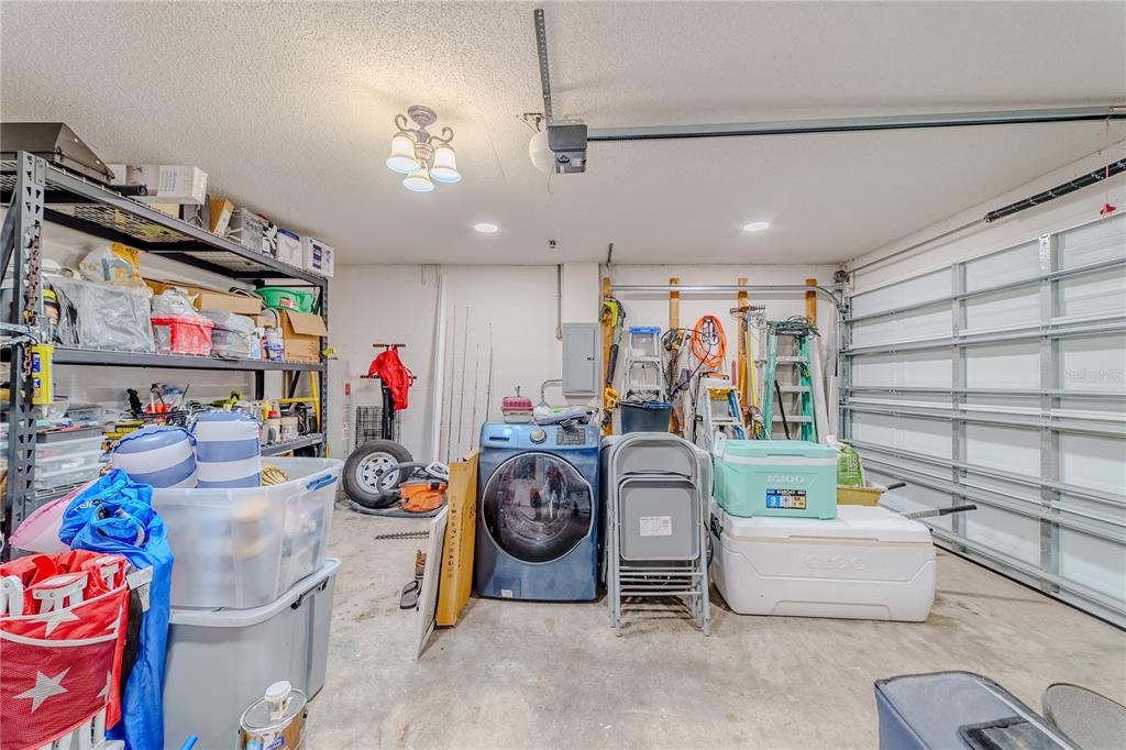 Undisclosed Address Spring Hill, FL 34609 - Photo 30 of 32 a view of storage and utility room