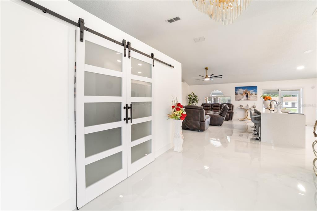 Undisclosed Address Spring Hill, FL 34609 - Photo 10 of 32 a storage room with lots of appliances