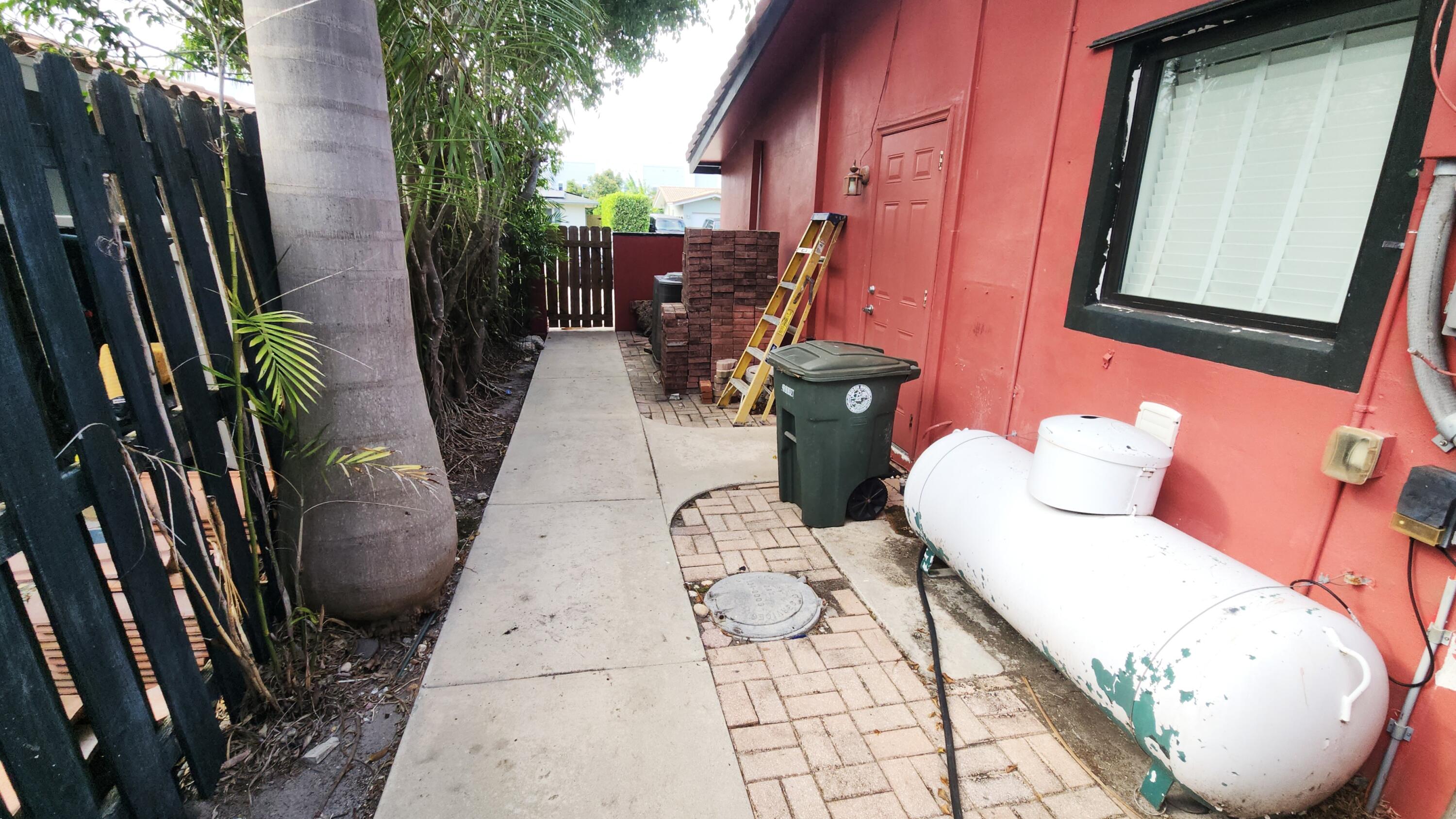 1250 Southwest 4th Street Boca Raton, FL 33486 - Photo 44 of 47 side yard with gas tank