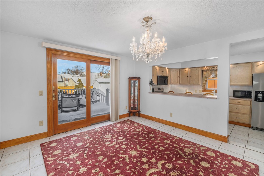 136 King Philip Road East Providence, RI 02916 - Photo 8 of 20 dining room leads to back deck