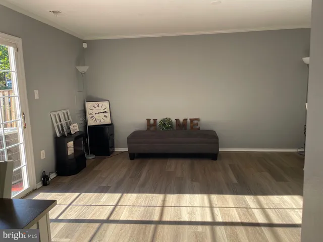 a living room with a couch and a table