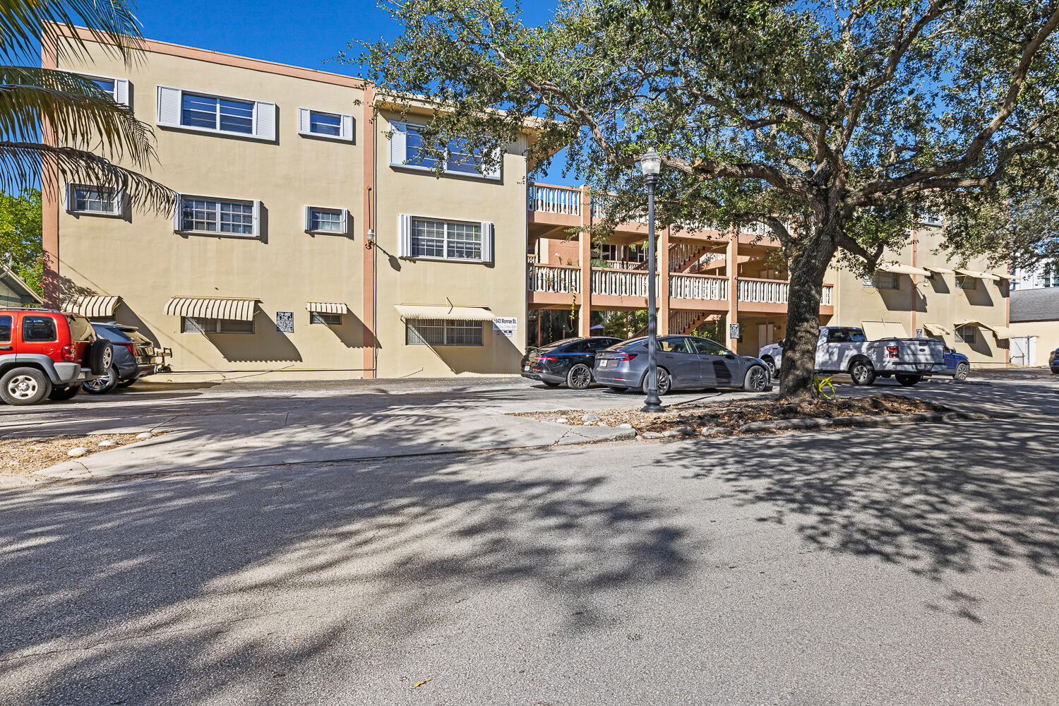 1943 Monroe Street, Unit 110D Hollywood, FL 33020 - Photo 1 of 28 a view of a street with cars