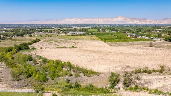 a view of a city with an ocean beach