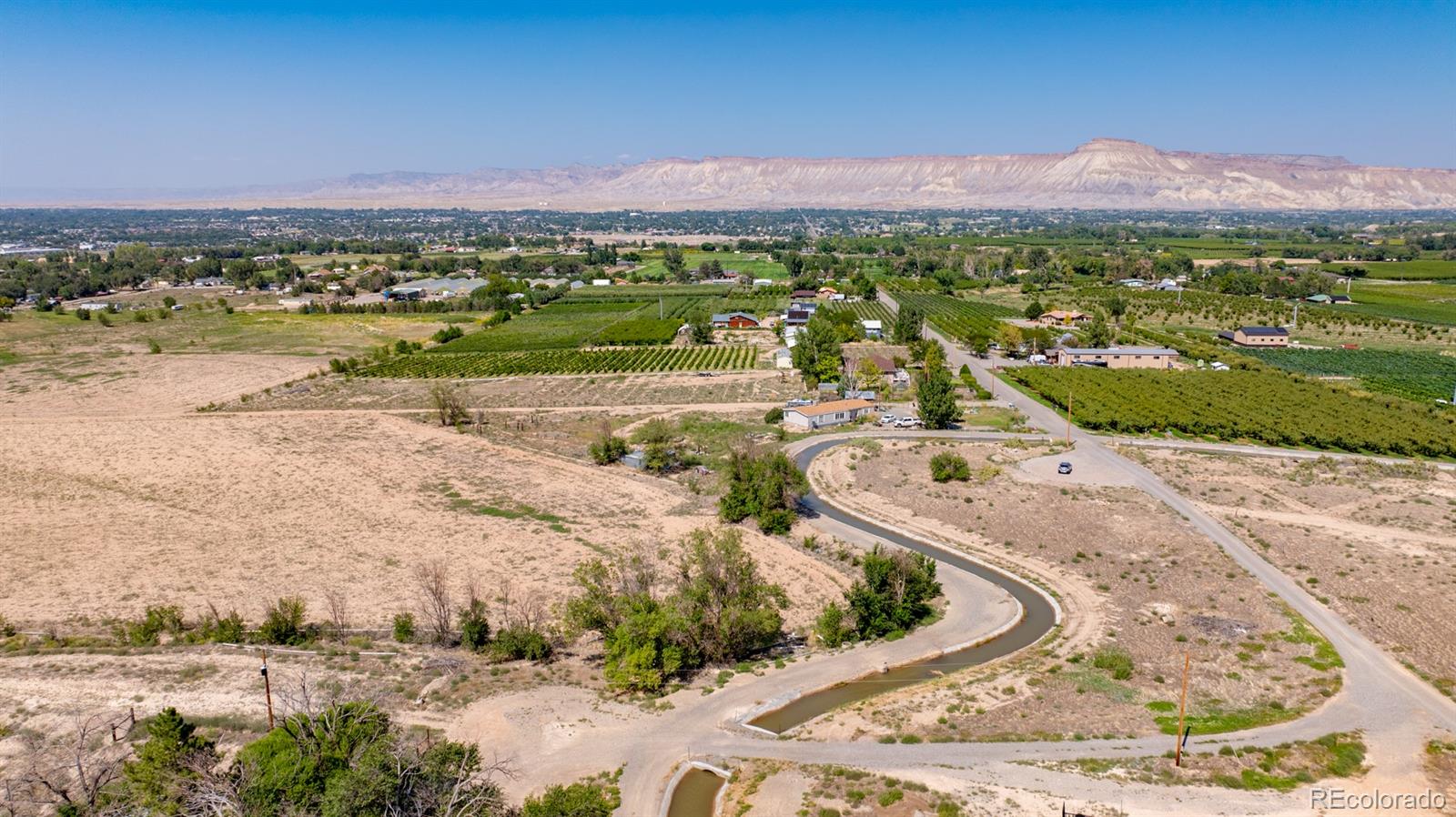 267 33 Road Palisade, CO 81526 - Photo 15 of 43 a view of a city with an ocean beach