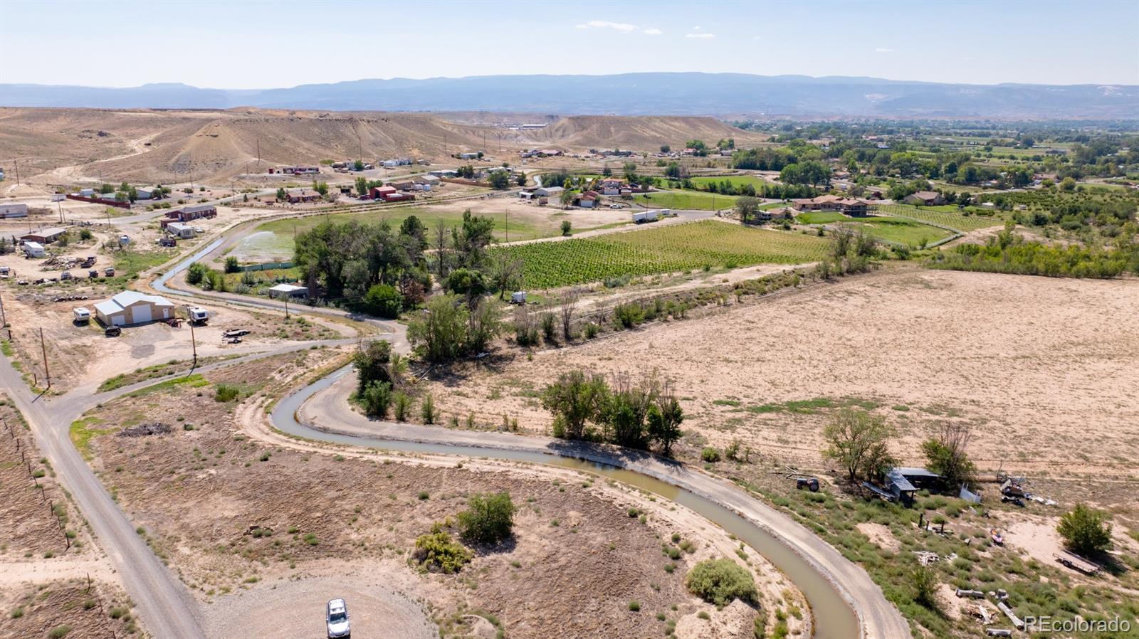 267 33 Road Palisade, CO 81526 - Photo 19 of 43 an aerial view of a house with a mountain