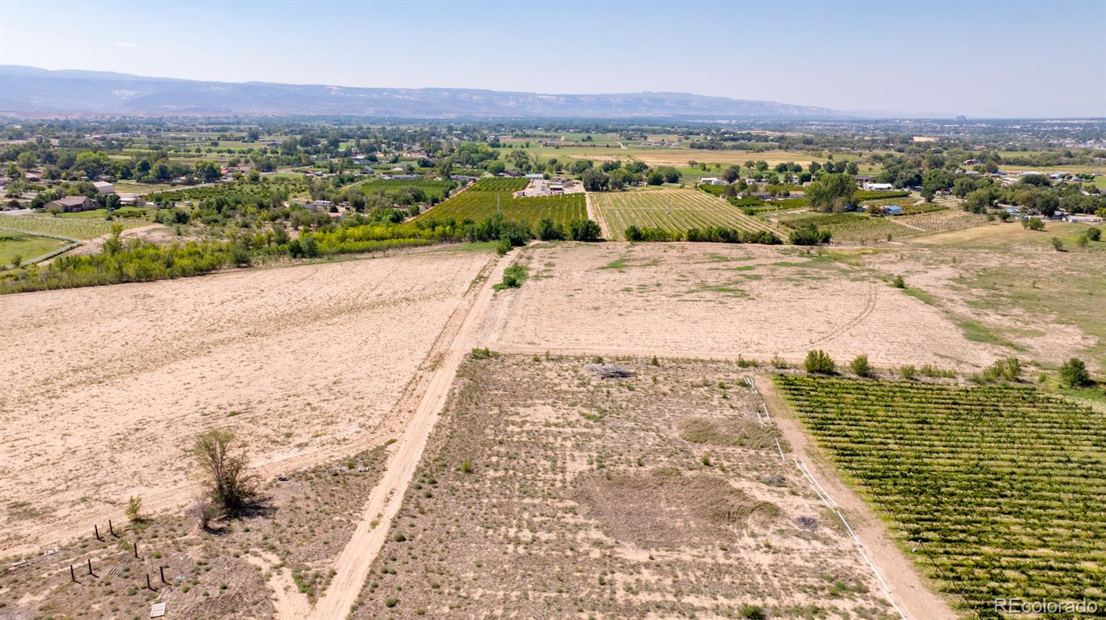 267 33 Road Palisade, CO 81526 - Photo 20 of 43 a view of a city with an ocean beach