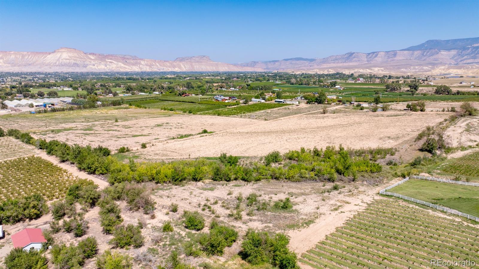 267 33 Road Palisade, CO 81526 - Photo 29 of 43 a view of an ocean and a mountain