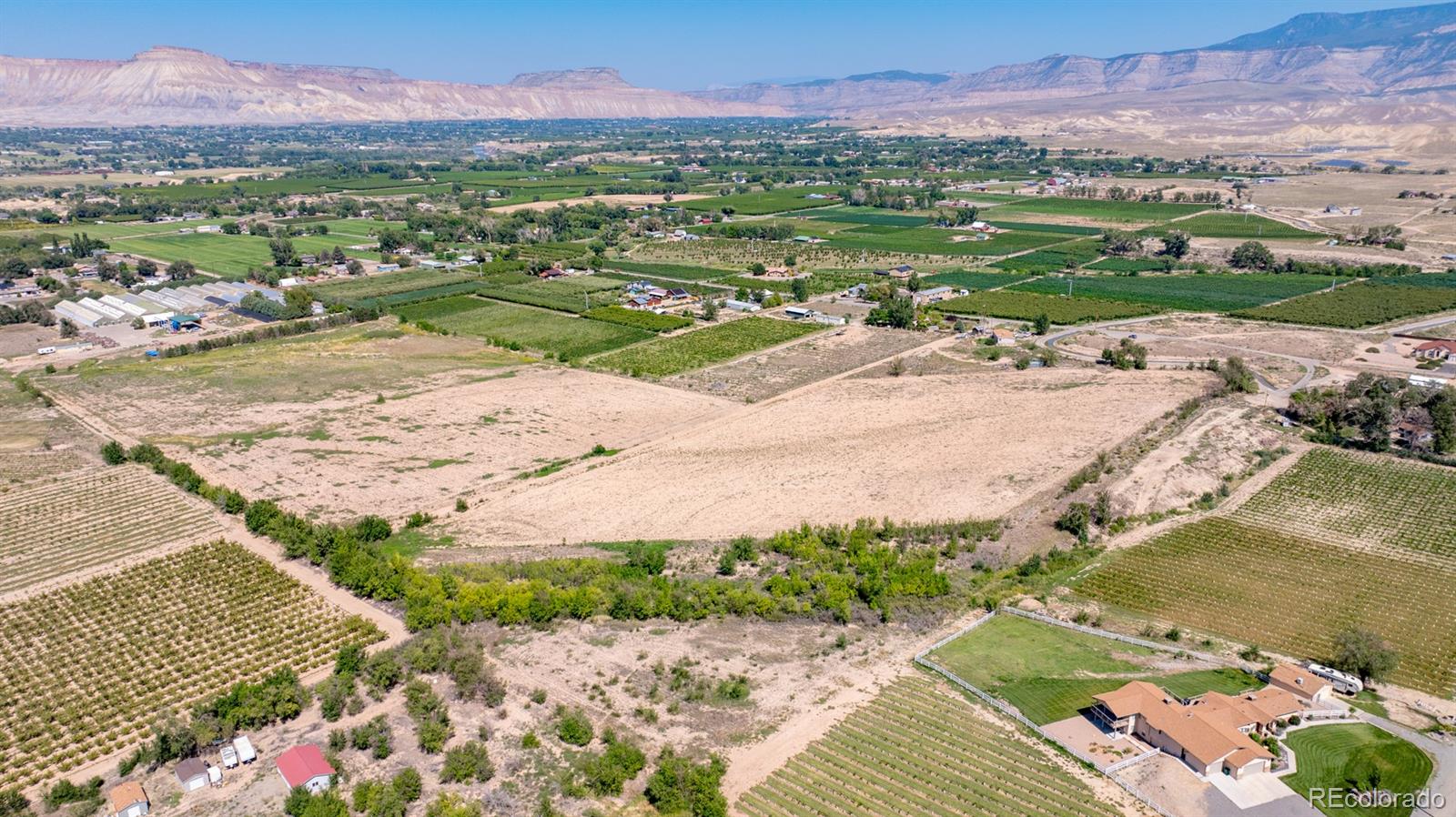 267 33 Road Palisade, CO 81526 - Photo 30 of 43 a view of a city with a lake