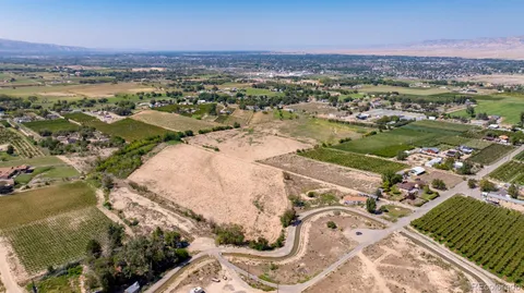 an aerial view of a city with lots of residential buildings